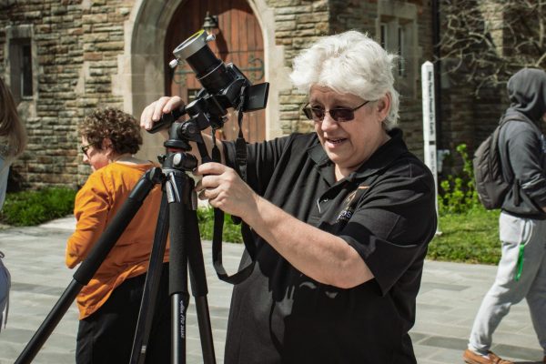 Dr. Inge Heyer, Professor of Physics at Loyola University Maryland, photographing the eclipse.